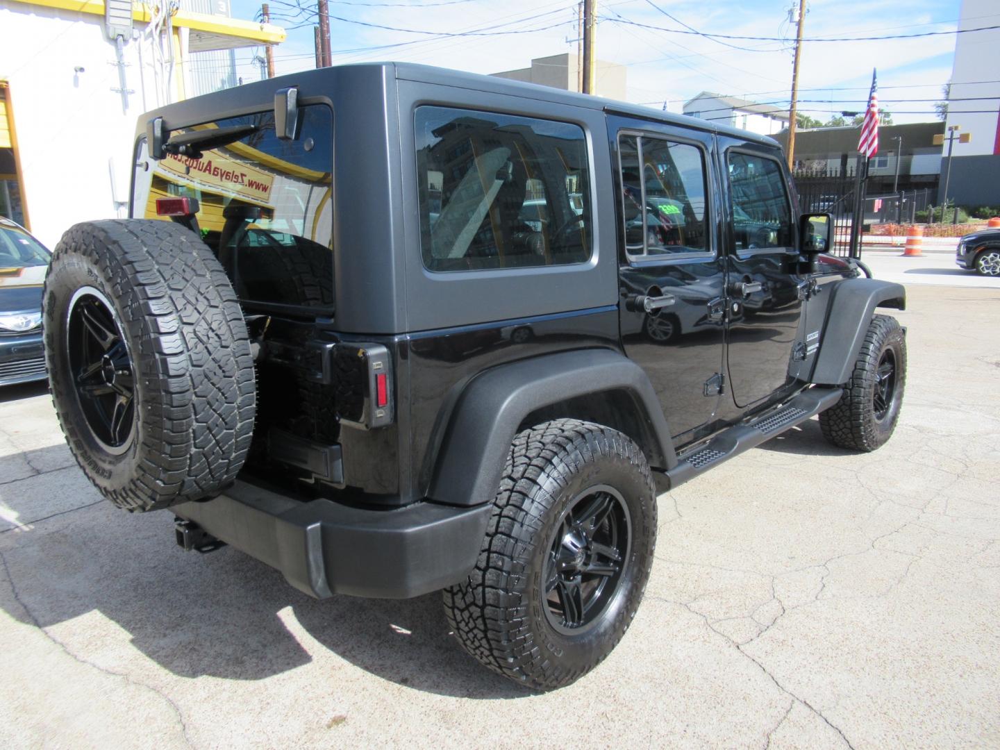 2017 Black /Black Jeep Wrangler UNLIMITED SPORT (1C4BJWDG1HL) with an 3.6L V6 F DOHC 24V engine, Automatic transmission, located at 1511 North Shepherd Dr., Houston, TX, 77008, (281) 657-1221, 29.798361, -95.412560 - 2017 JEEP WRANGLER UNLIMITED SPORT VIN: 1C4BJWDG1HL517754 1 C 4 B J W D G 1 H L 5 1 7 7 5 4 4 DOOR WAGON/SPORT UTILITY 3.6L V6 F DOHC 24V GASOLINE REAR WHEEL DRIVE W/ 4X4 - Photo#29